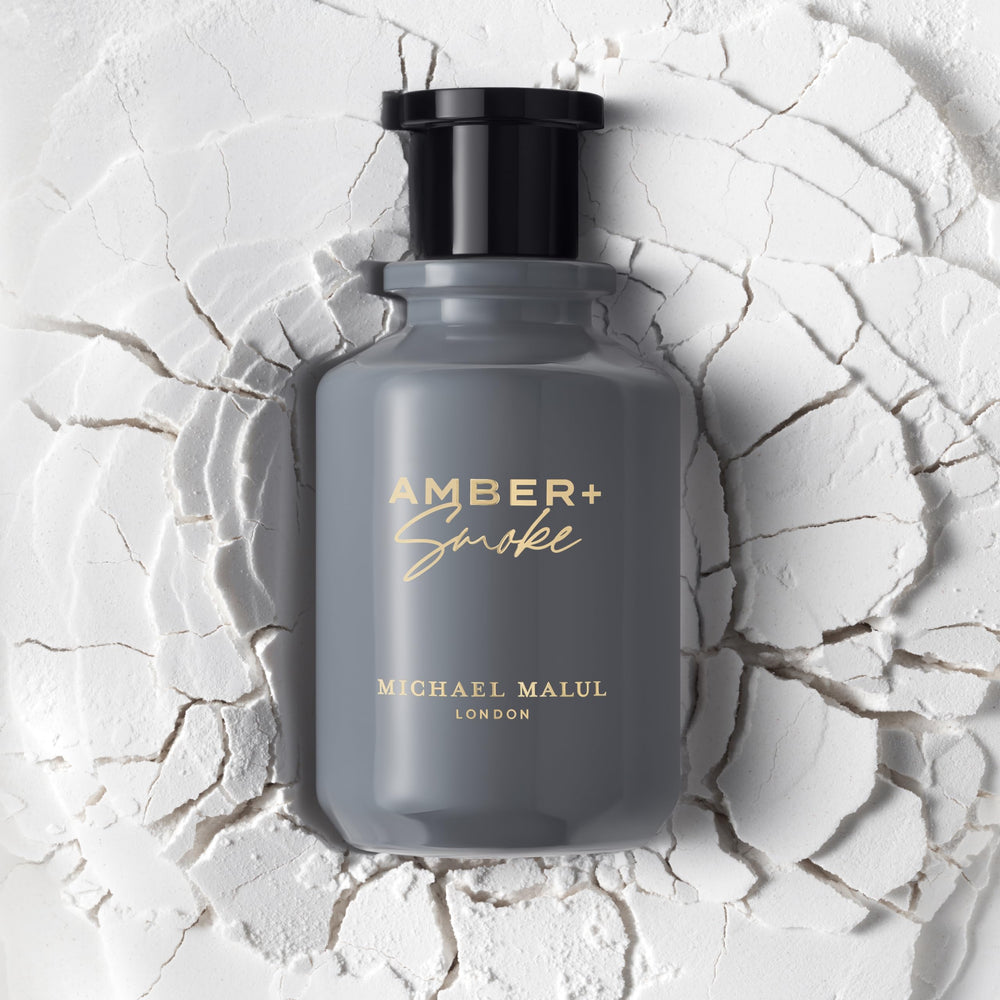 Amber + Smoke base notes of moss and pine, cozy and lingering.