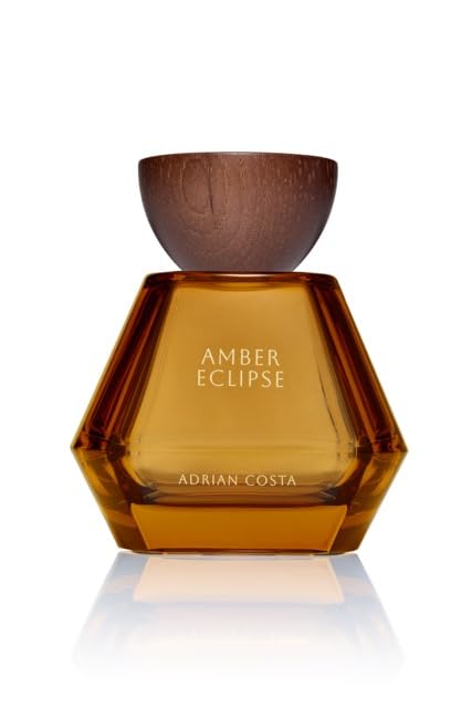 Michael Malul Adrian Costa Amber Eclipse bottle front, signaling bold evening wear