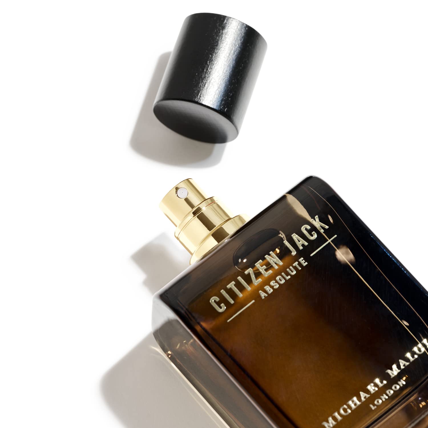 Close-up of Citizen Jack Absolute bottle cap, showcasing luxurious glass and premium branding