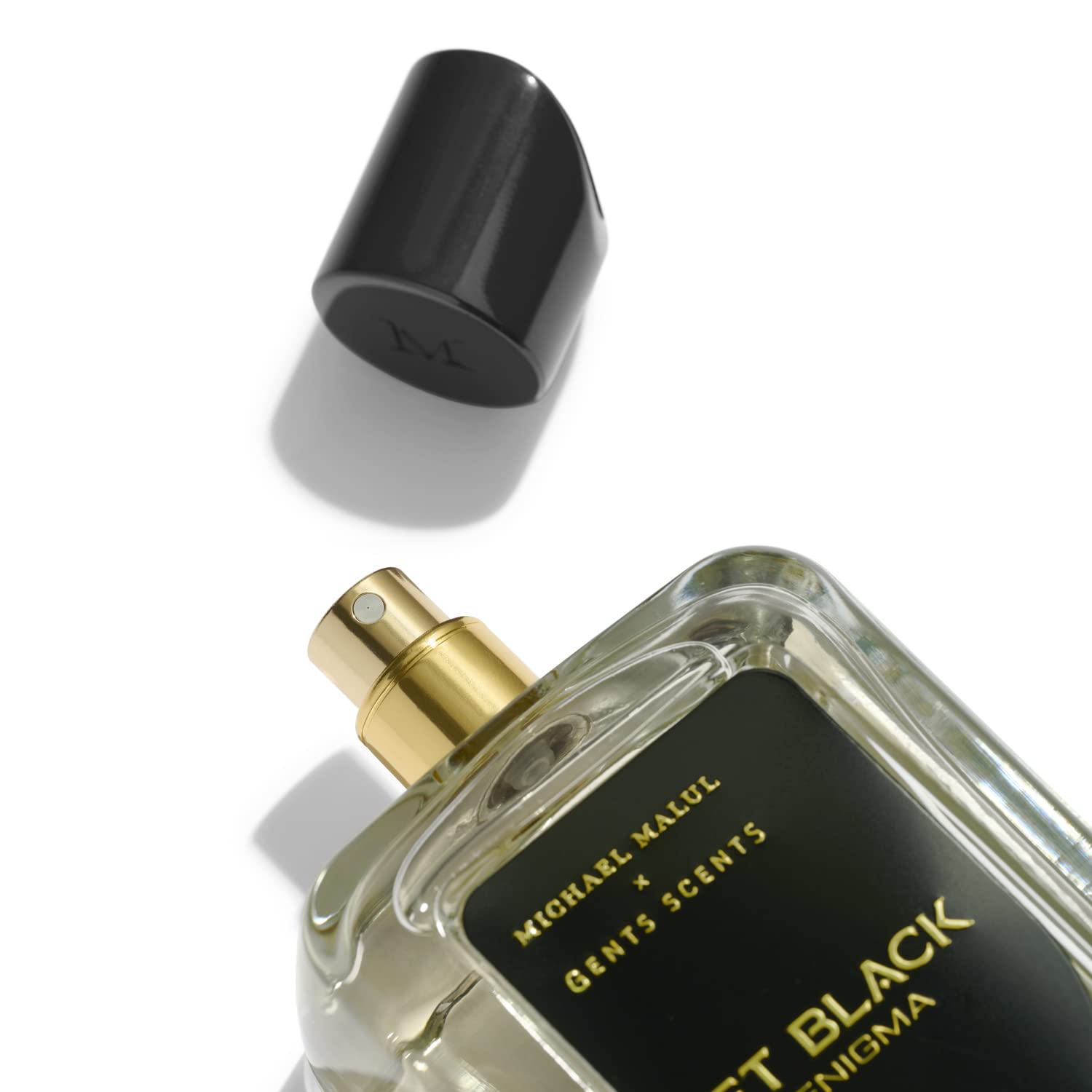 Close-up of the spray cap on Michael Malul Enigma for precise application.