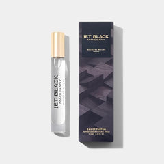 Michael Malul Jet Black Mahogany bottle closeup for bold on-the-go fragrance.