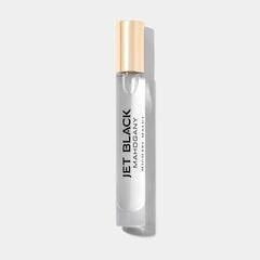 Michael Malul Jet Black Mahogany cap and bottle highlighting premium, travel-ready scent.