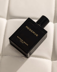 Michael Malul Jet Black Reserve spray action shows easy, even application.