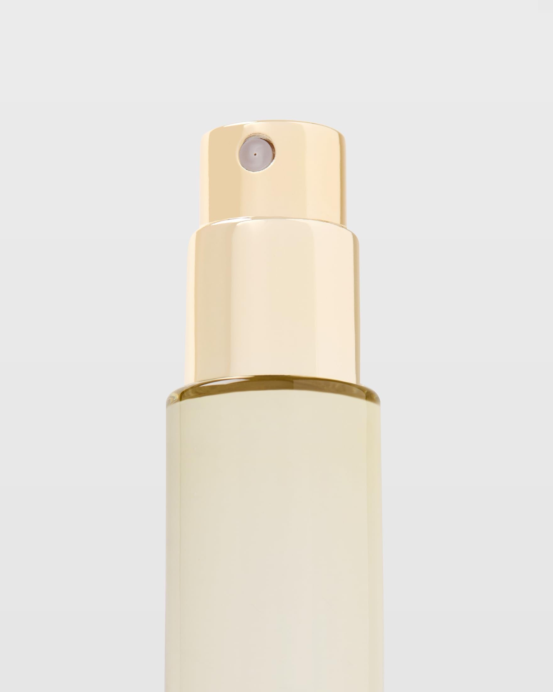 Michael Malul Marley Soul Rebel bottle pour capturing sunlit moments and joyful vibes