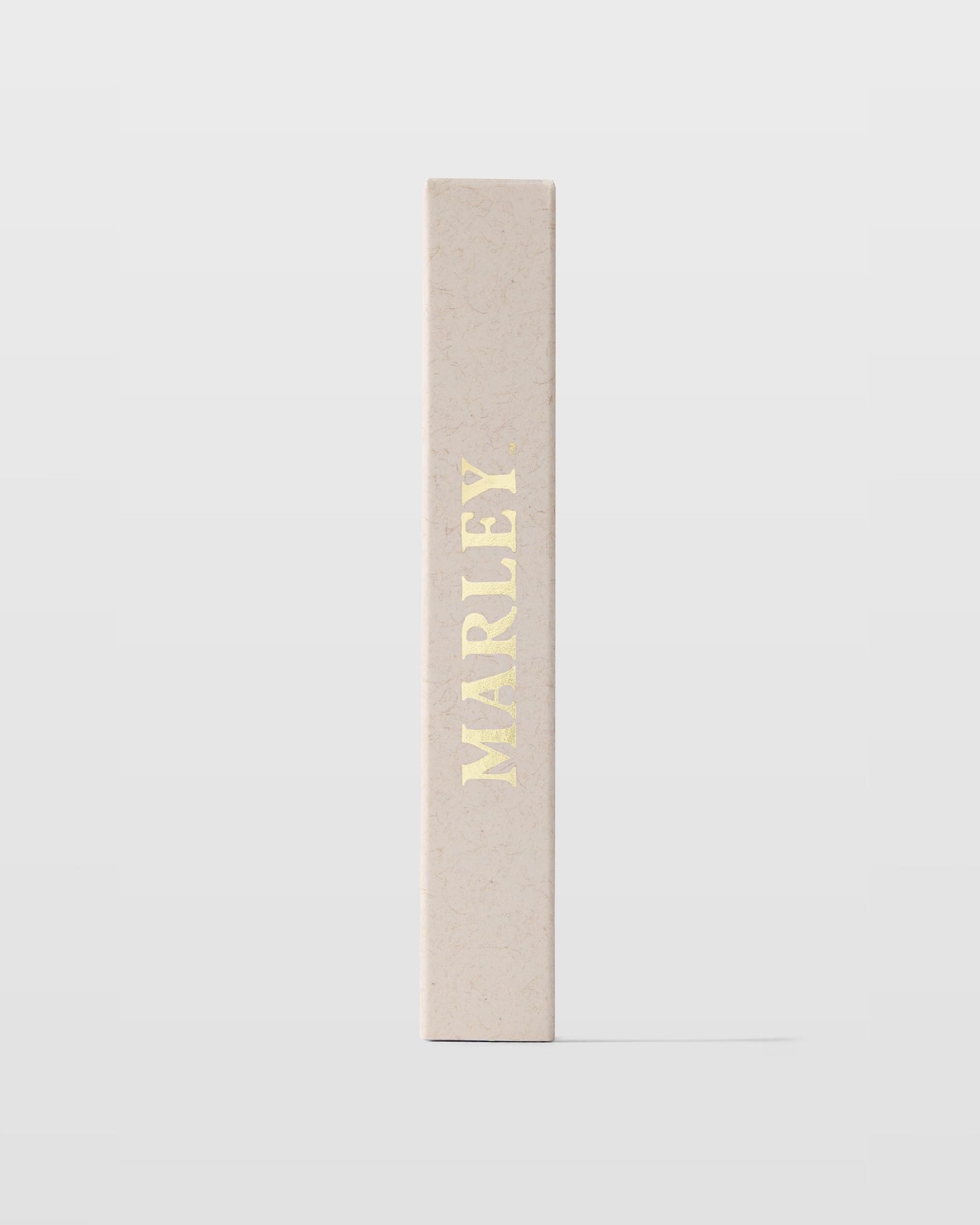 Michael Malul Marley Soul Rebel fragrance application highlighting energetic mango and grapefruit blend