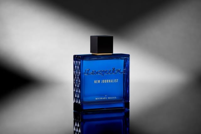 Michael Malul New Journalist Esquire bottle on wood surface with premium feel.