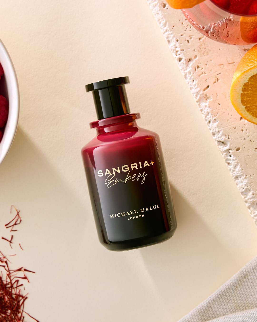 Michael Malul Sangria+Embers night city scene evoking urban nightlife mood.