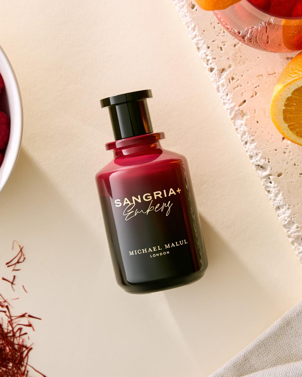 Michael Malul Sangria+Embers night city scene evoking urban nightlife mood.