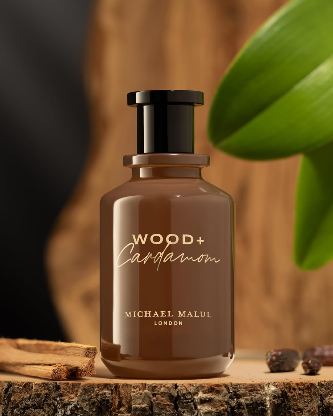 Lifestyle shot featuring Michael Malul Wood + Cardamom EDP.