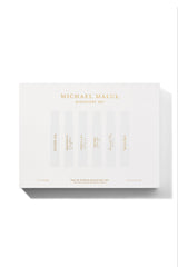 Michael Malul travel-size bottles lineup for on-the-go testing.