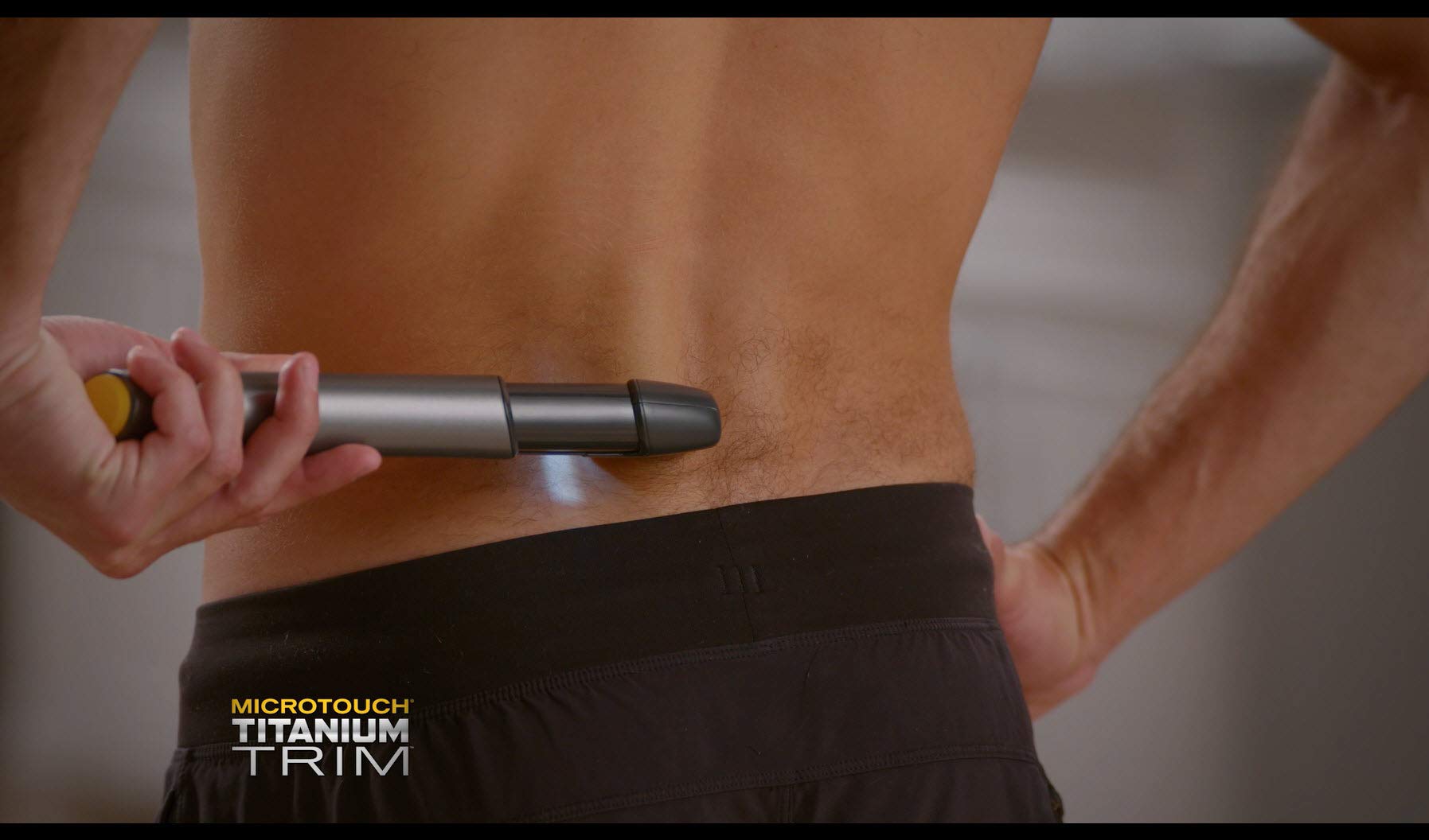 Back and shoulders grooming with MicroTouch Titanium TRIM