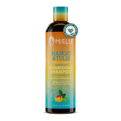 Mielle Organics Mango & Tulsi Shampoo bottle showcases nourishing formula for curly hair.