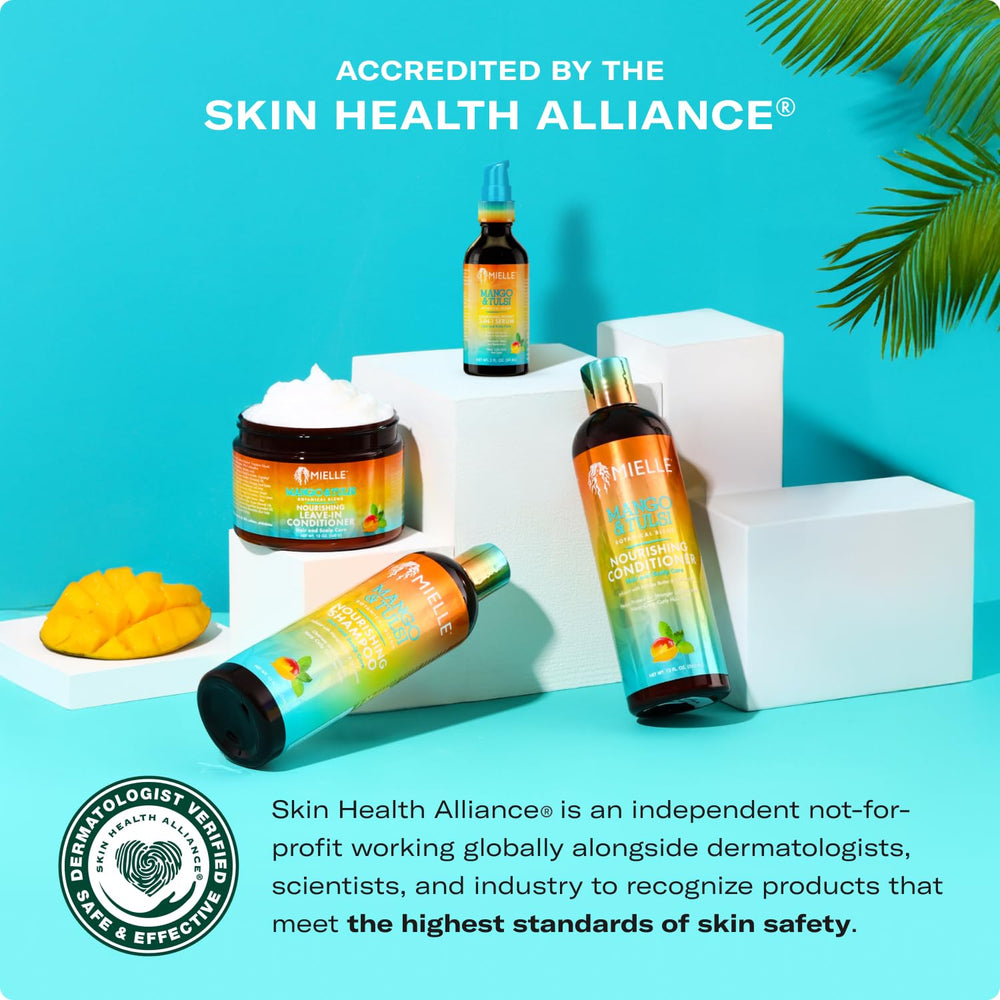 Mielle Mango & Tulsi shampoo foam demonstrates gentle cleansing for textured waves.
