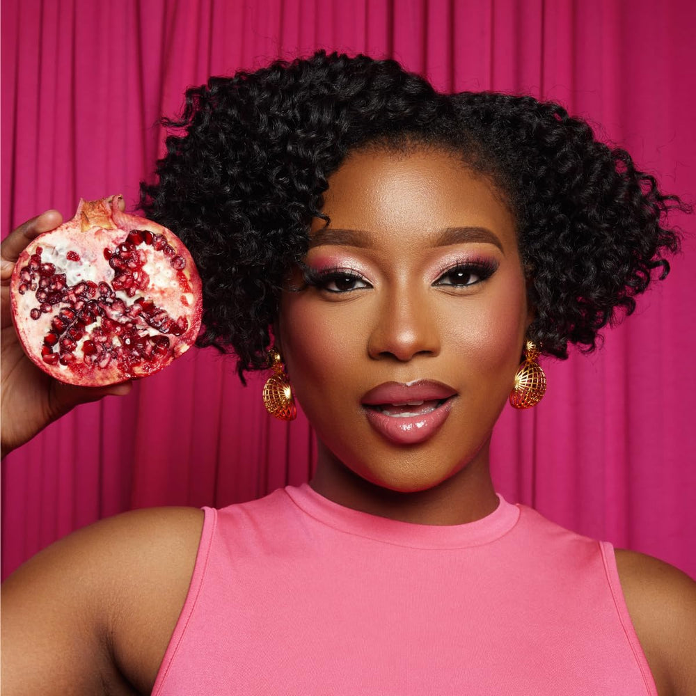 Mielle Organics conditioner with wide-tooth comb for smoother detangling.