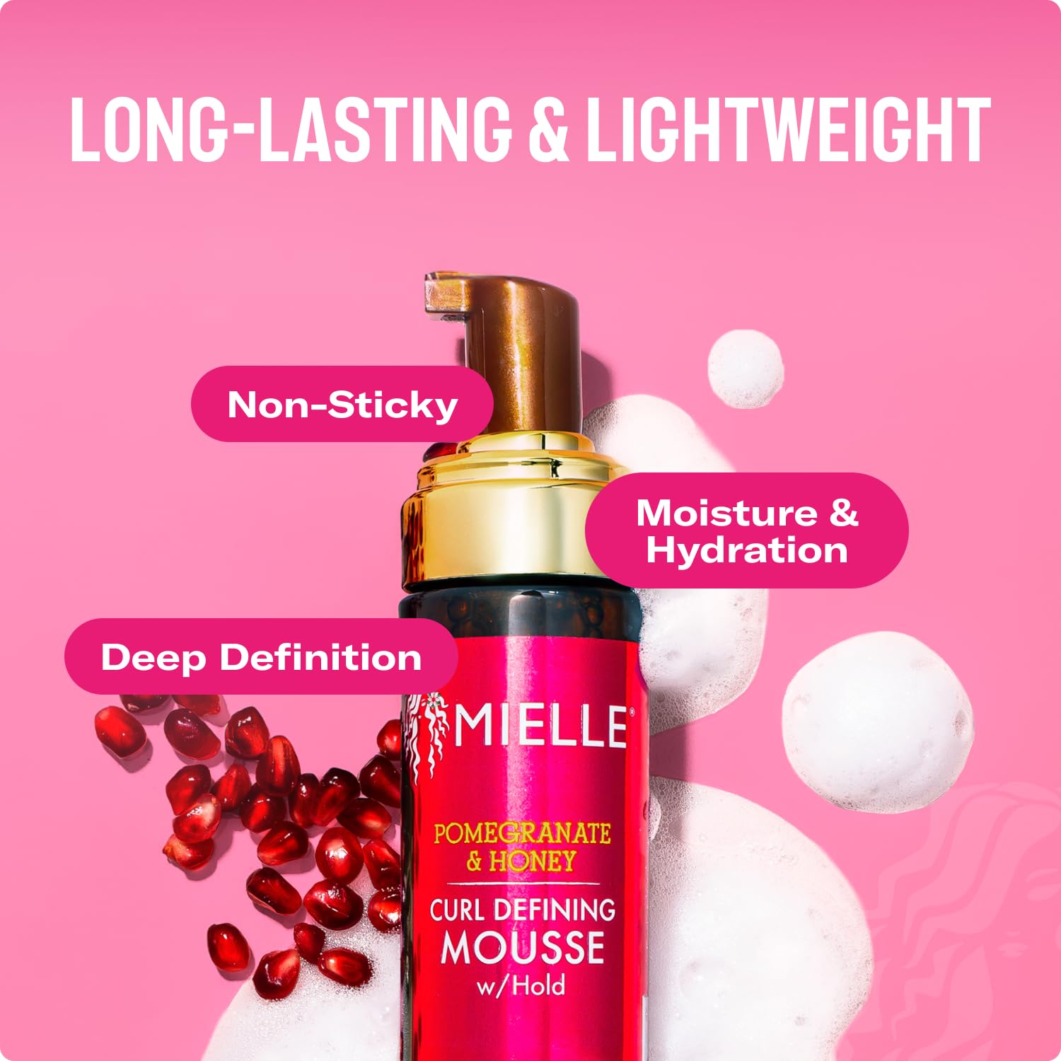Creamy mousse on hand demonstrates smooth, non-sticky styling for curls.