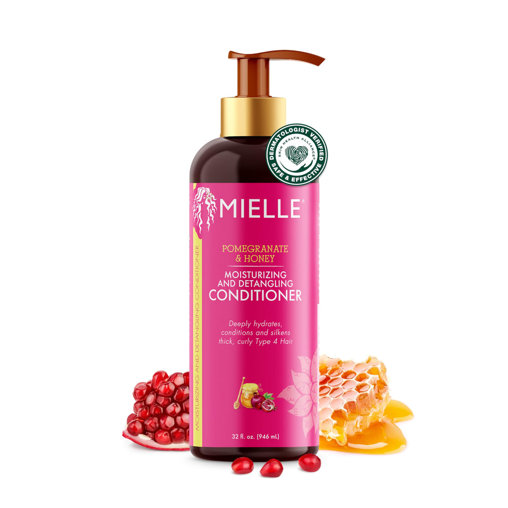 Mielle Organics Pomegranate & Honey detangling conditioner bottle provides hydrated curls.
