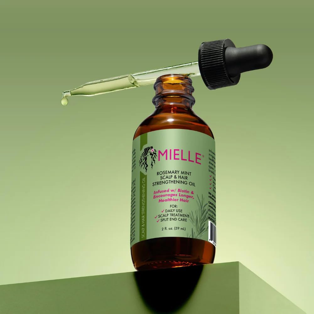 Mielle Organics Rosemary Mint Oil leaves with rosemary and mint visual cue