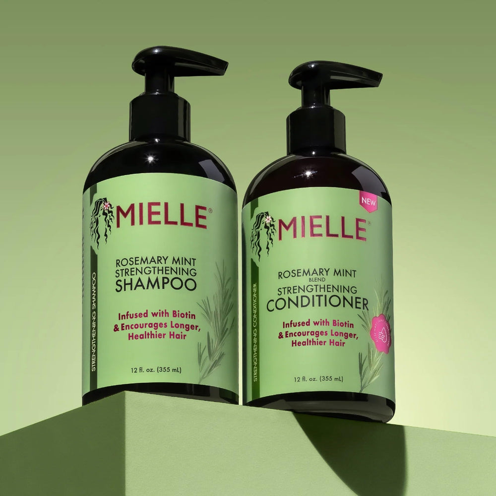 Mielle Rosemary Mint Conditioner bottle emphasizing detangling and shine.