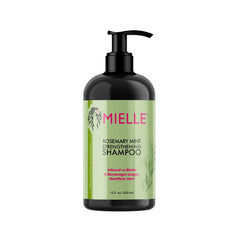 Close-up of Rosemary Mint Shampoo label emphasizing organic coconut and babassu oils.