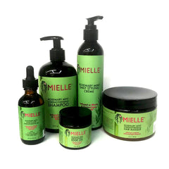 Mielle Rosemary Mint Strengthening Shampoo bottle refreshing hair with a minty cleanse and vitality.