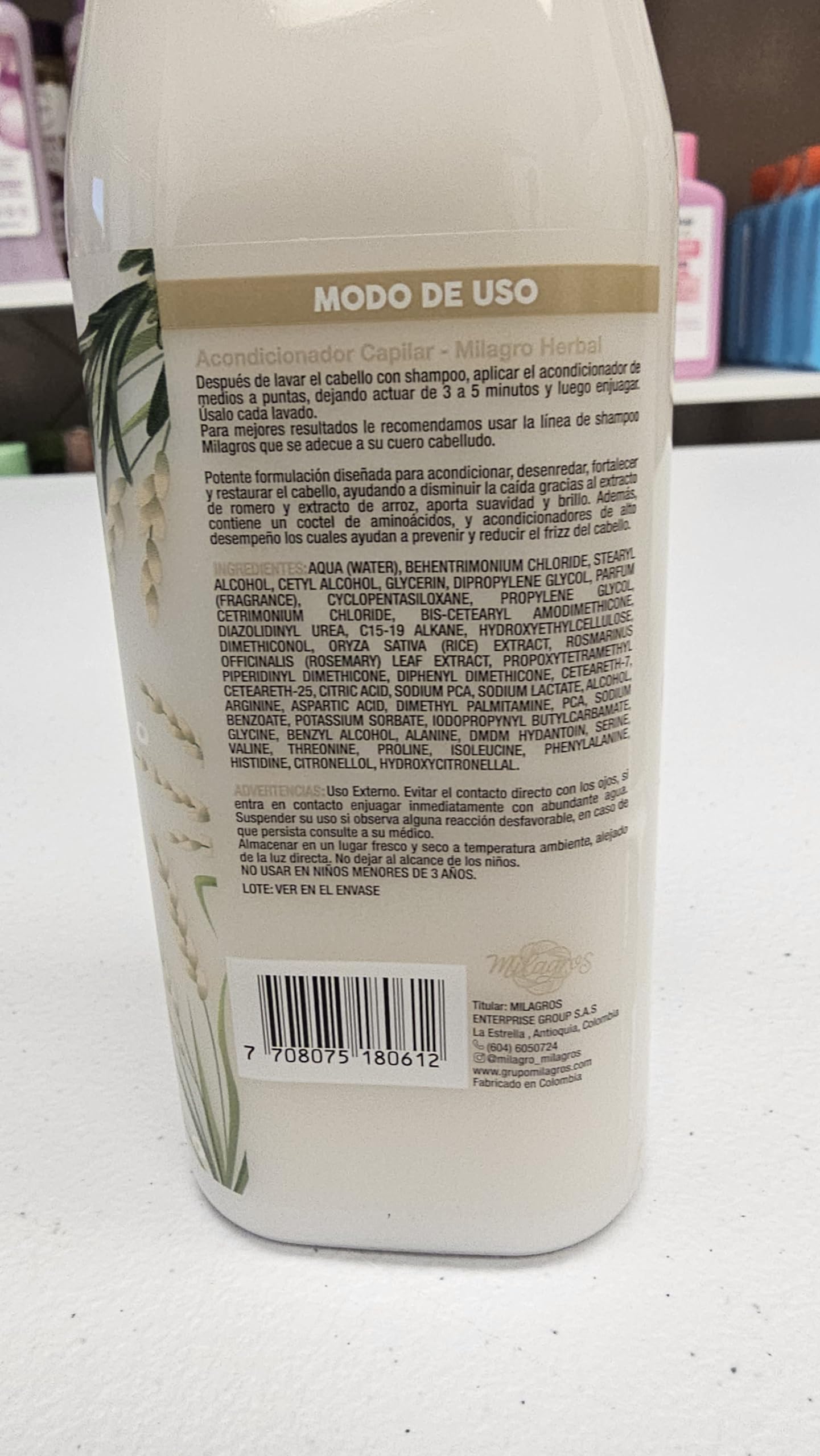 Milagros Herbal Conditioner applied on mid-lengths shows smoothness and manageability.