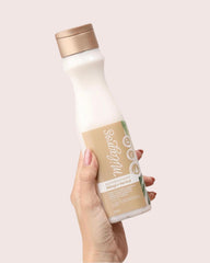 Milagros Herbal Shampoo with red onion extract hints at scalp nourishment.