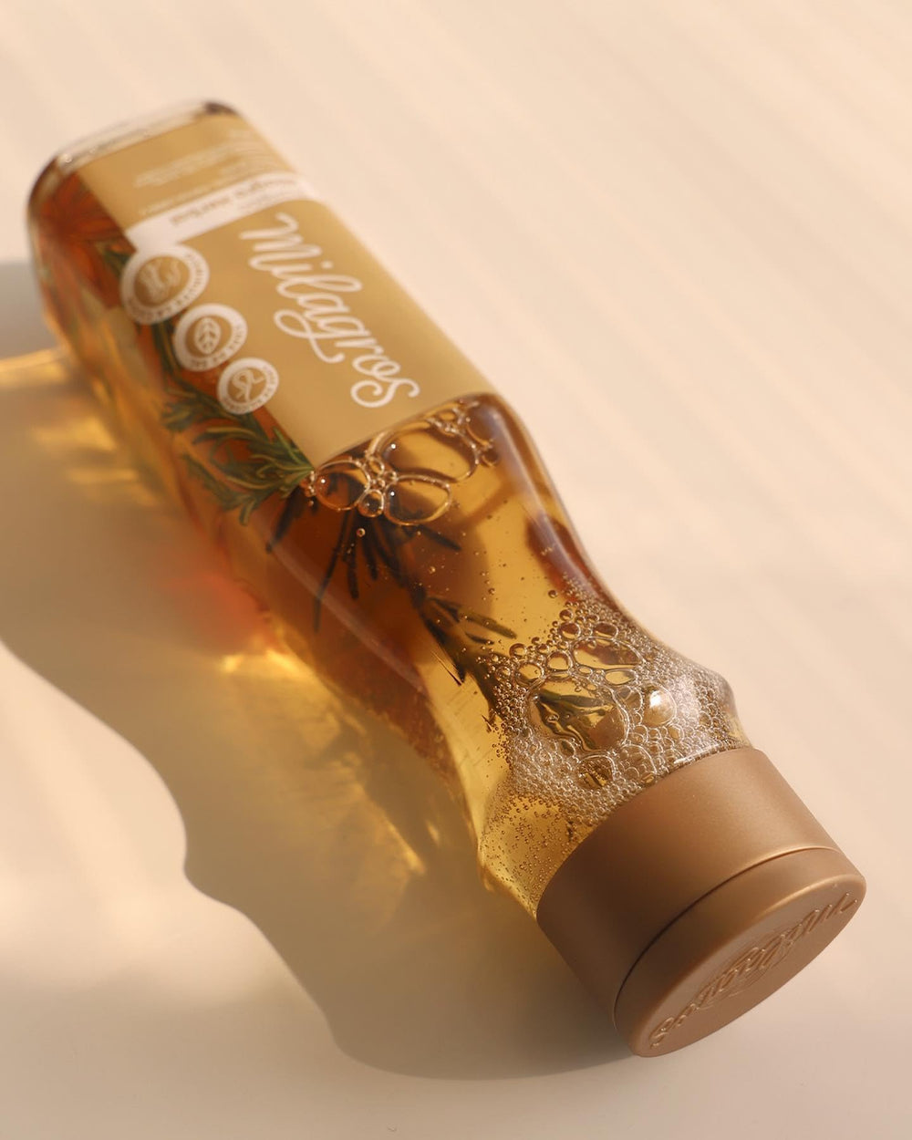 MILAGROS Rosemary Shampoo label highlights vitamins and amino acids.