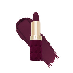 Milani Color Fetish Matte Lipstick Dahlia swatch reveals bold matte color.