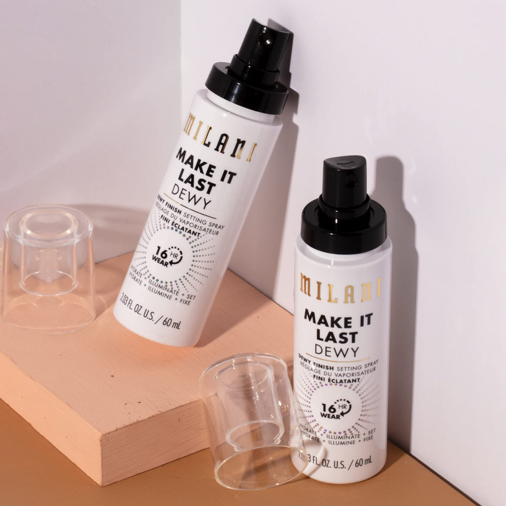 Milani Make It Dewy spray mist applied in zigzag for long wear.