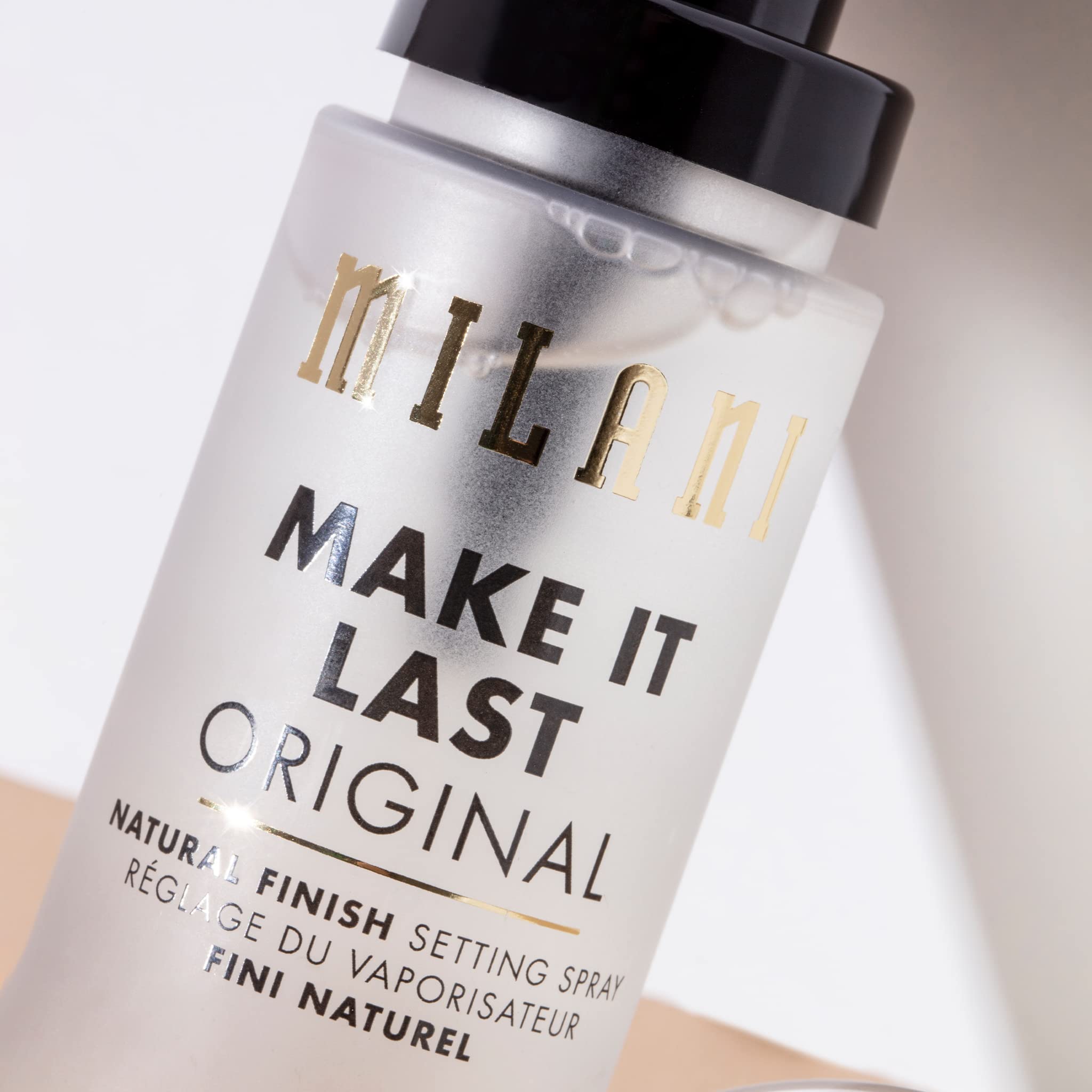 Milani Make It Last Original spray on skin for setting makeup.