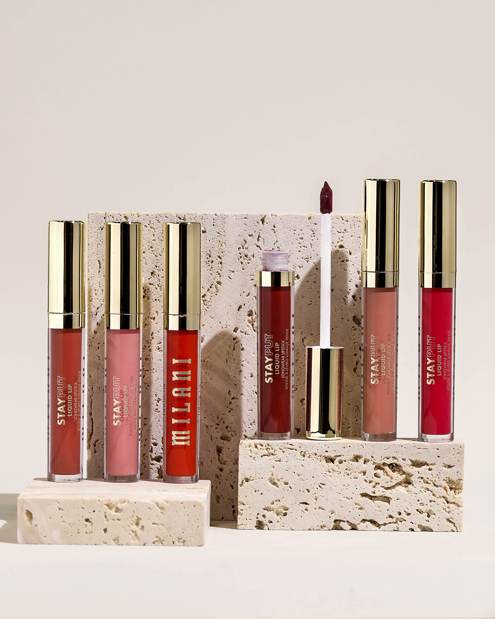Milani Stay Put Lipstick demonstrates 12-hour transfer-proof wear.