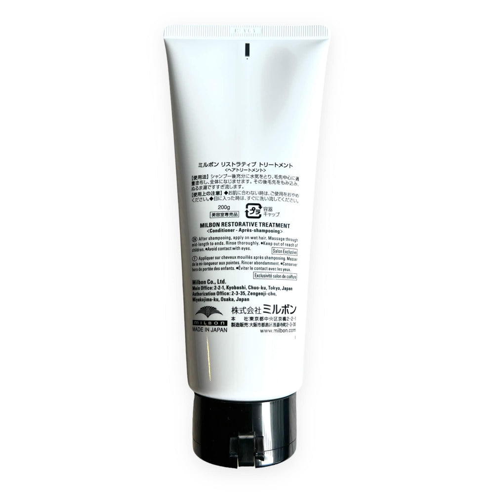 Milbon Repair Restorative Treatment packaging on shelf demonstrates professional care.