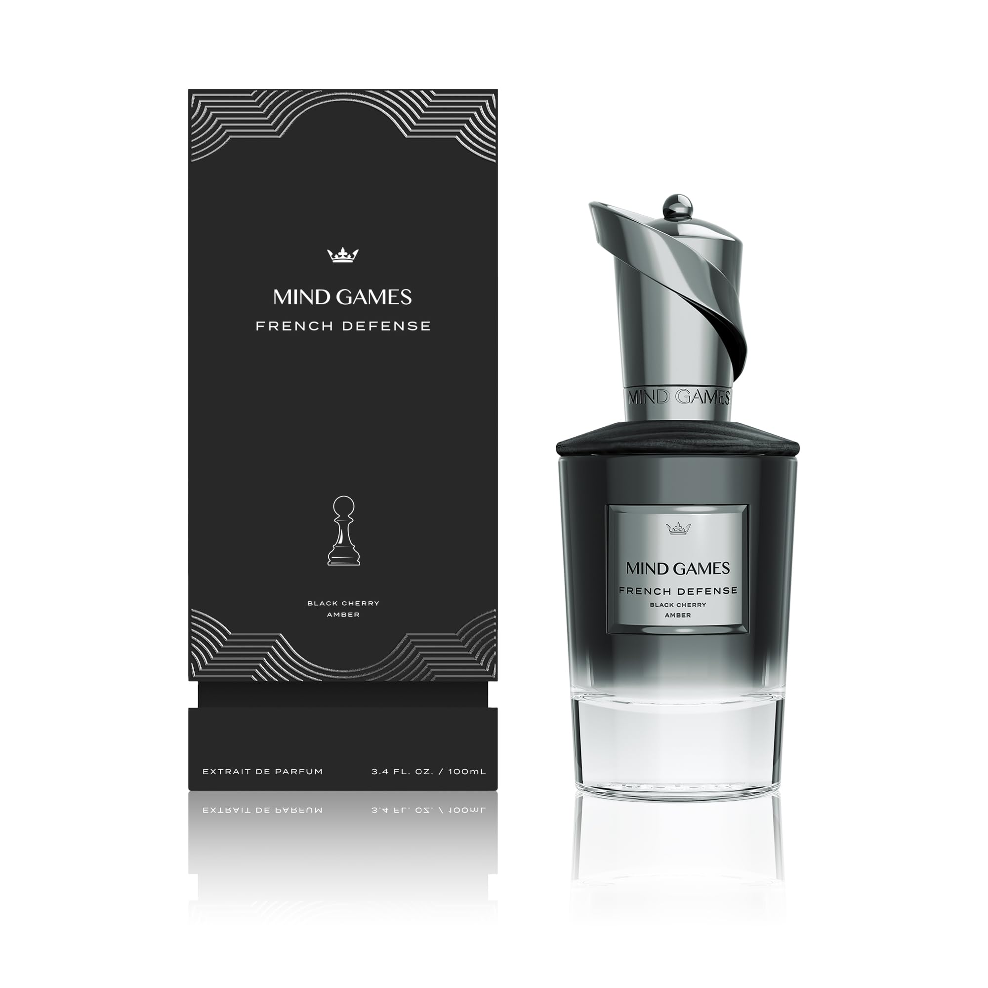 MIND GAMES French Defense amber cedarwood close-up evokes warm lasting depth for evening wear.
