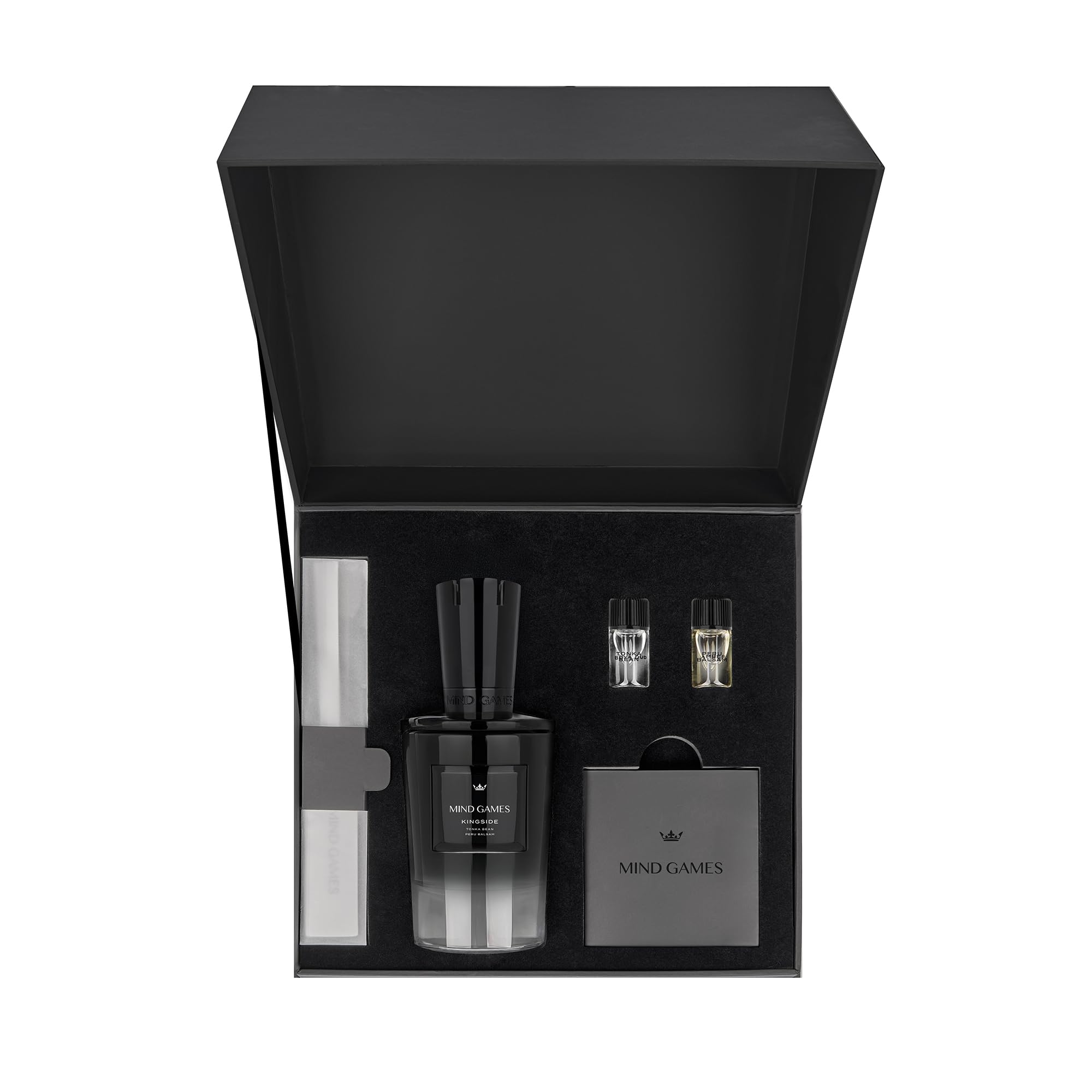 MIND GAMES Kingside middle notes of peony and amber add softness with lasting sophistication.