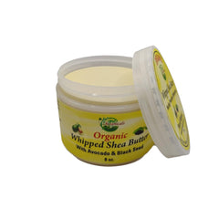 Mine Botanicals shea butter texture close-up reveals creamy consistency.