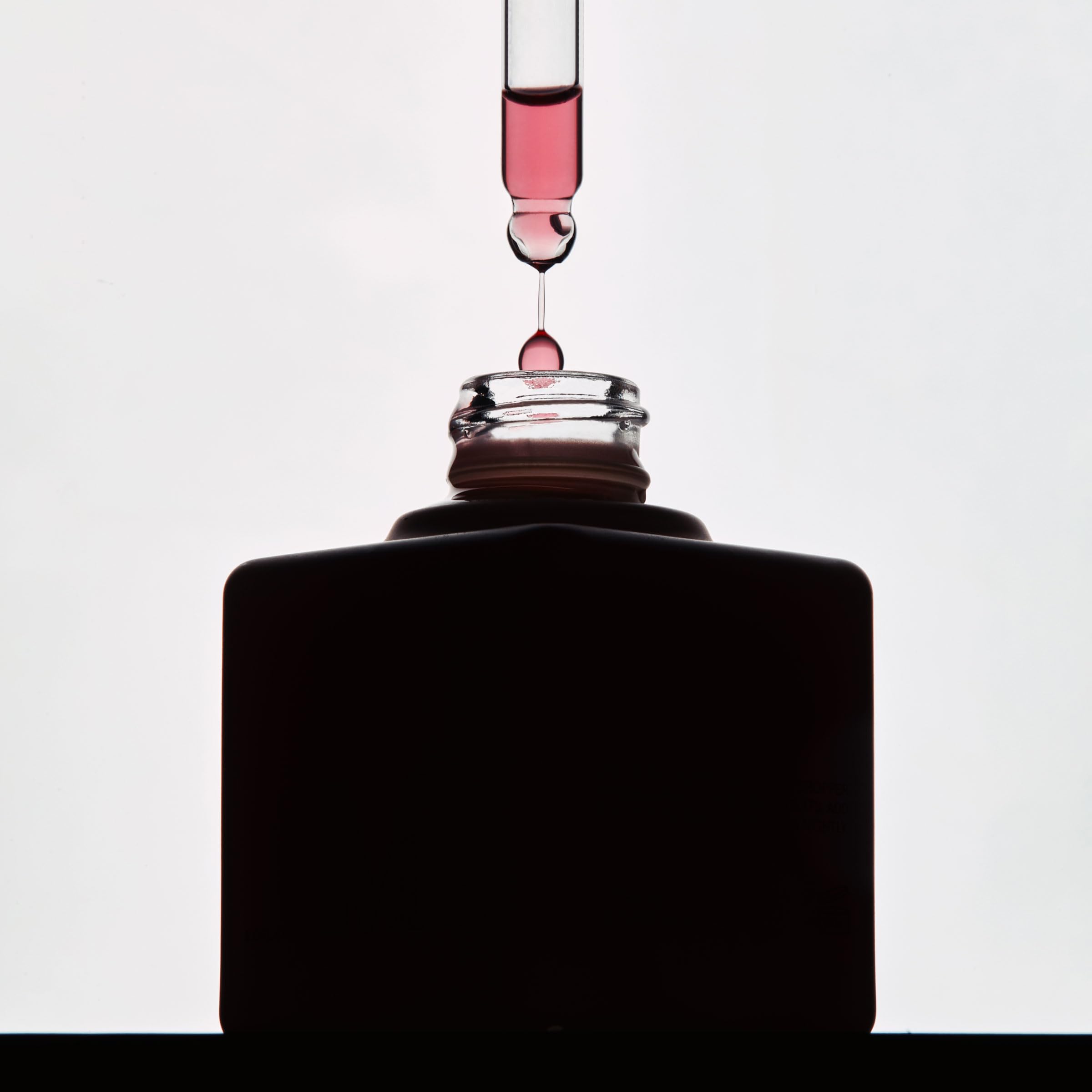 Minimalist bathroom display of Dr. Diamond's Metacine serum