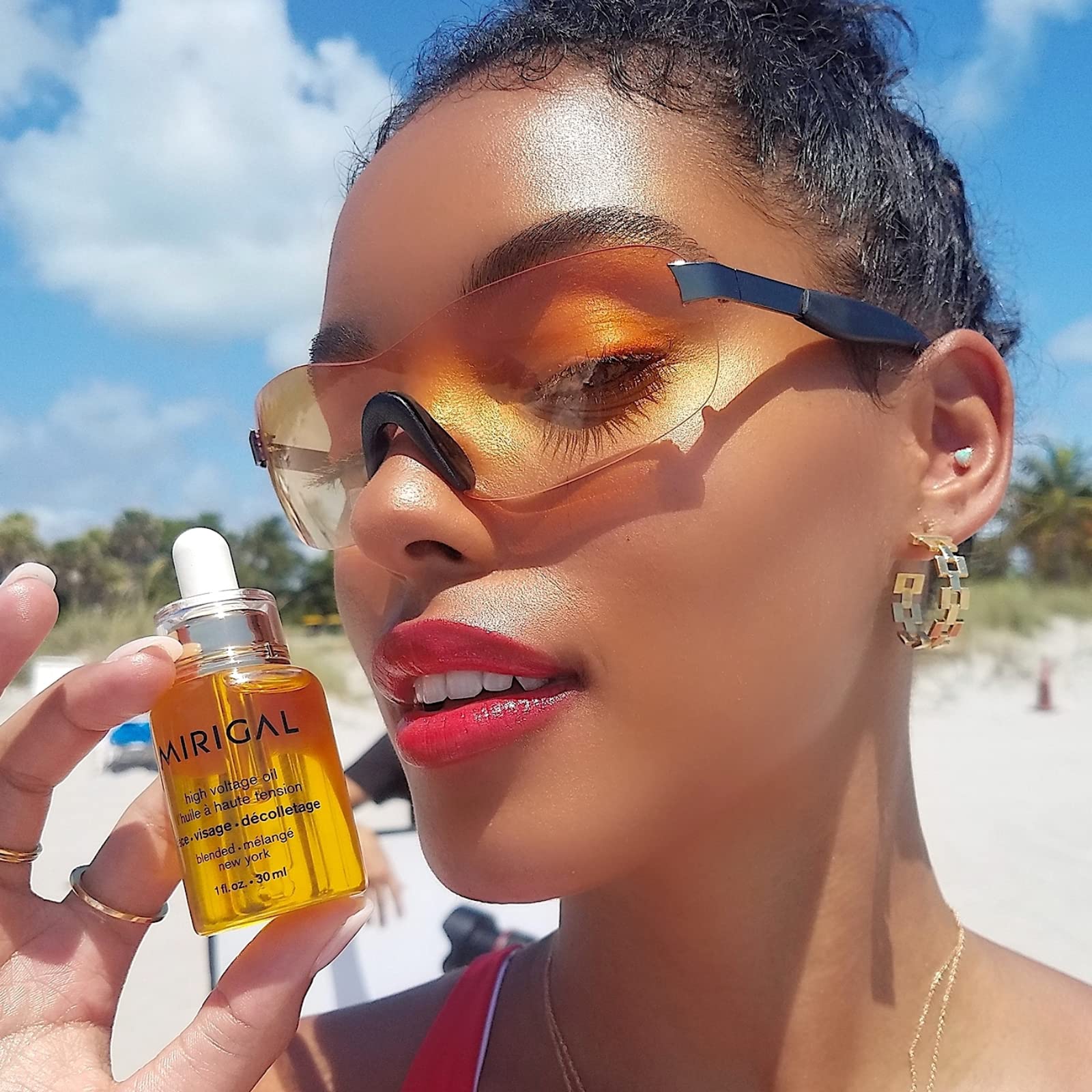 MIRIGAL High Voltage Oil being applied to the clean face for nourishment