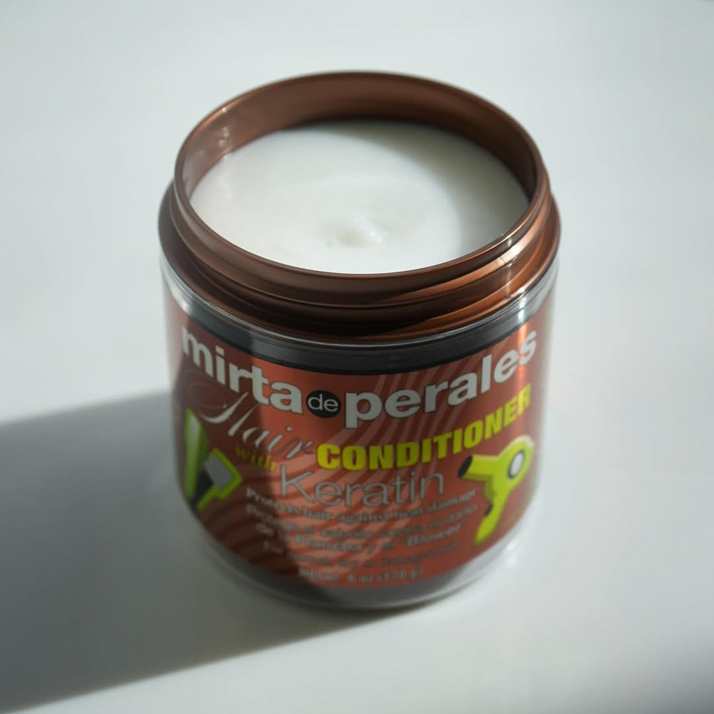Keratin focus image highlights hydrolyzed keratin support for resilient strands.