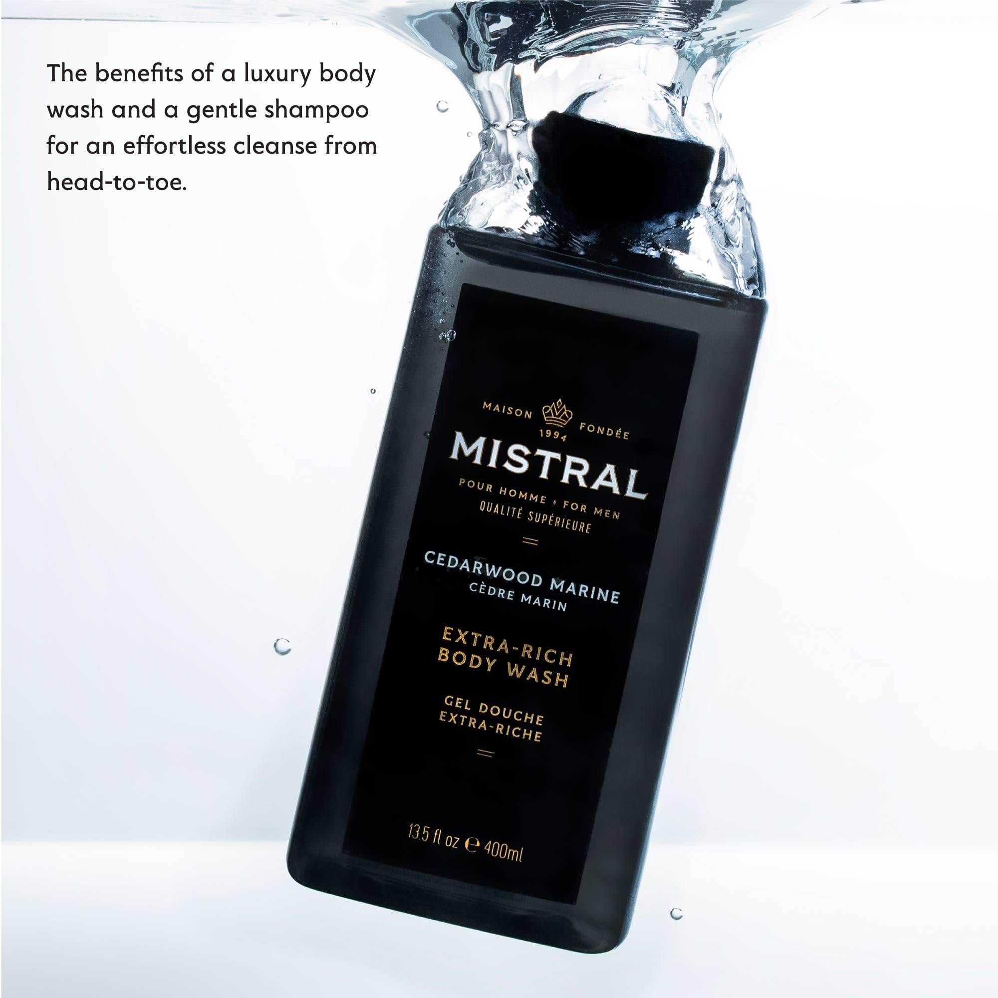 Mistral Cedarwood Marine bottle in shower emphasizing convenient 2-in-1 use.