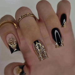 MISUD medium square press-on nails with black gold glitter tip for a glam salon-style manicure at home.