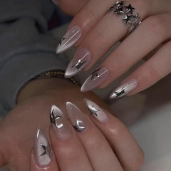 Mivota almond cat eye nude nails featuring 3D stars for a chic party-ready look.