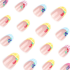 Mivota nails feature cherries and blueberries for playful summer vibes
