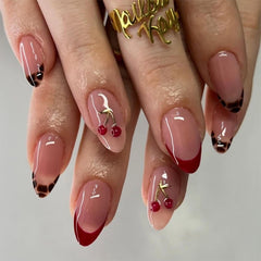 Mivota nails with 3D cherry design and gold branches for a luxe finish