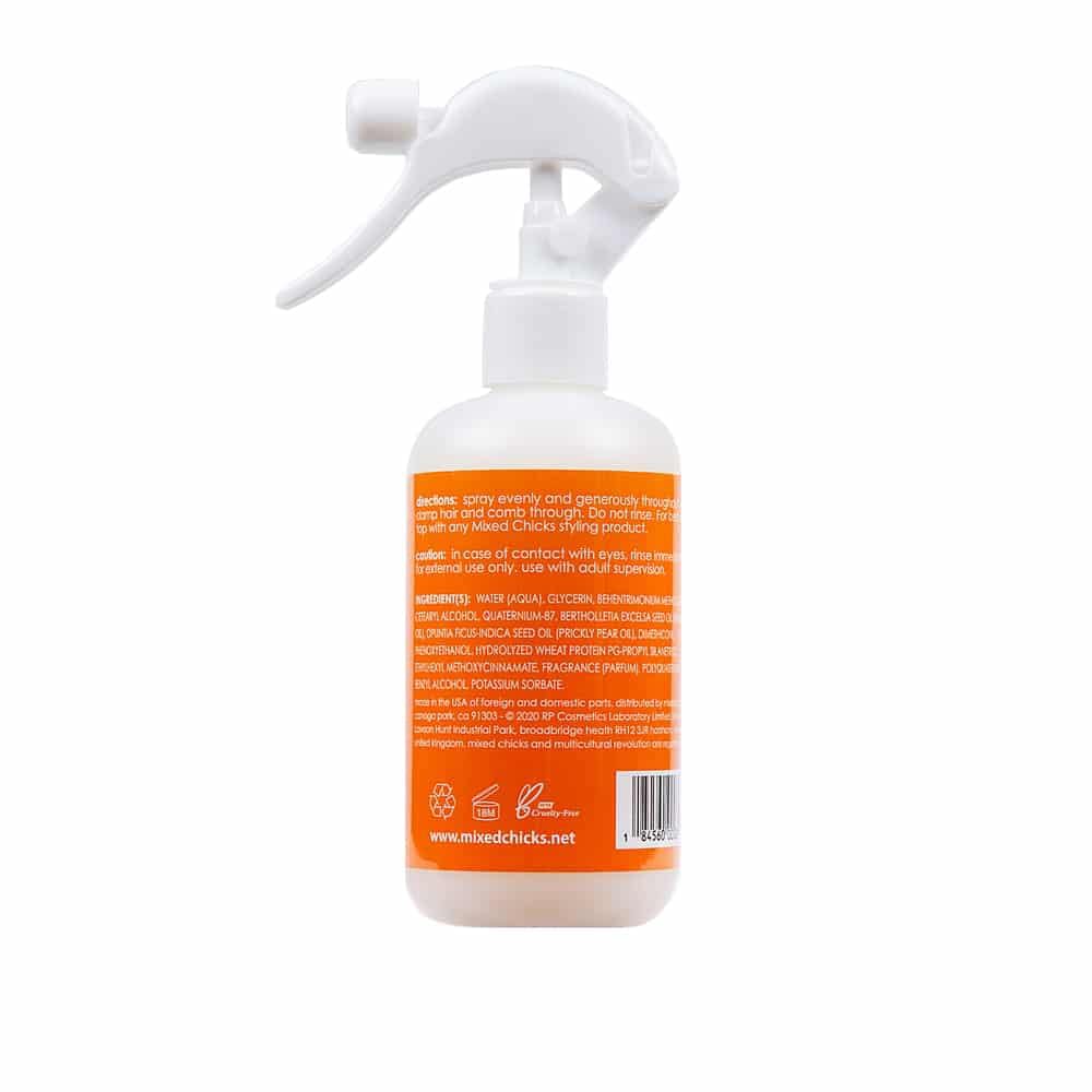 Mixed Chicks Base Coat spray for even application and frizz control.