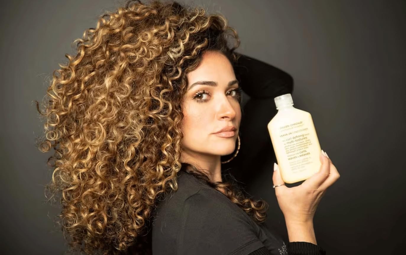 Mixed Chicks frizz-control shine image suggests manageable frizz and glow.