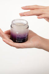 Elegant jar packaging of MIZON Collagen Power Lifting Cream with generous supply