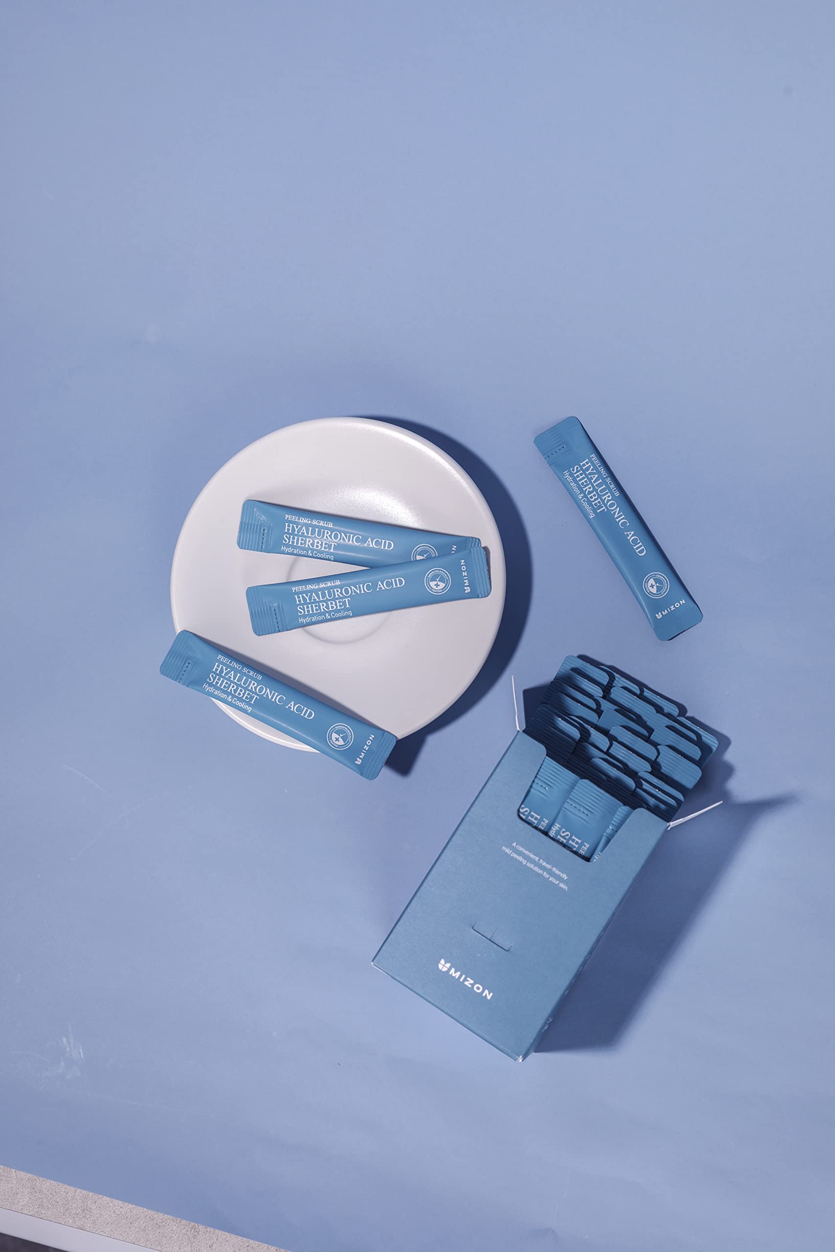 MIZON peeling scrub menthol-refresh; cool, revitalizing cleansing experience.