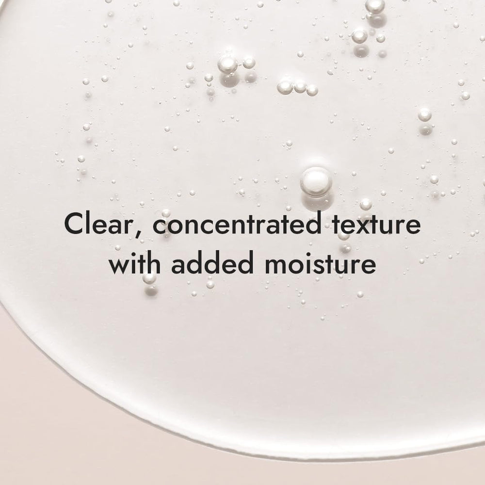 MIZON Snail Repair Intensive Toner being applied to the face for hydration.