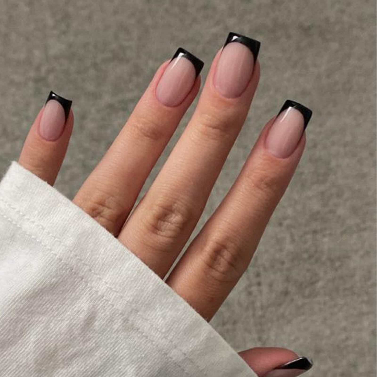 Modelones Black French Tip press-on nails set for quick, long-lasting manicures.