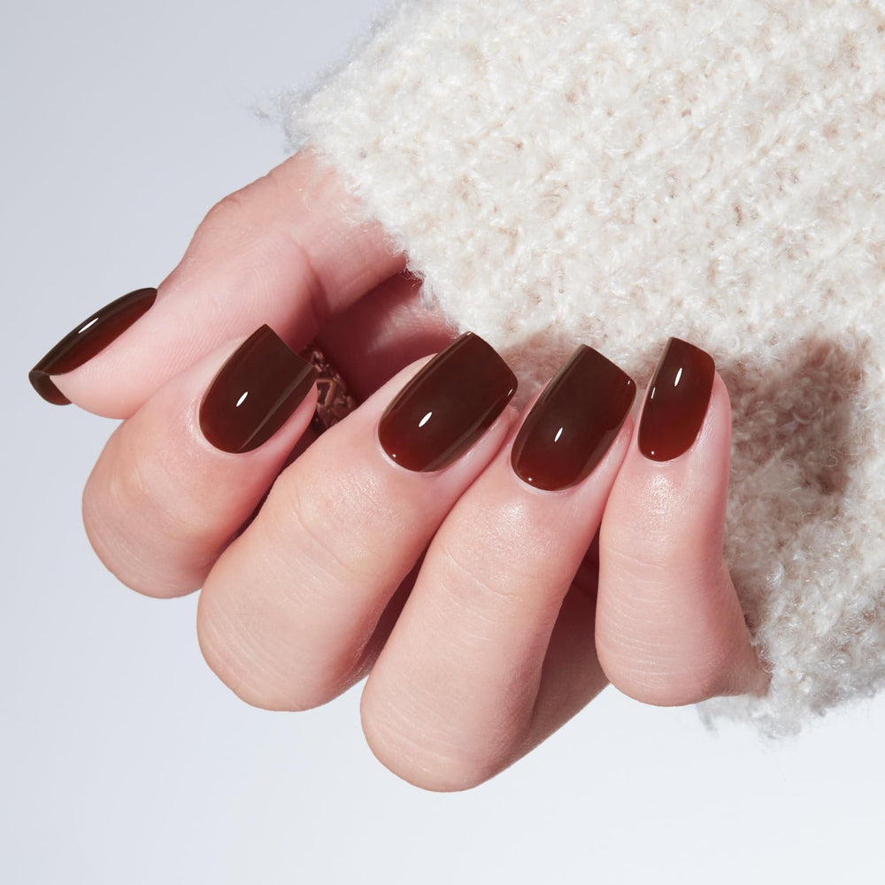 Modelones brown press-on nails displayed in 16 sizes for a precise fit.